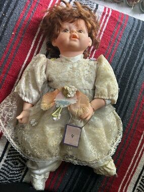 Faux Porcelain Rubber Collectible Doll in Ivory Floral Dress - Unbranded